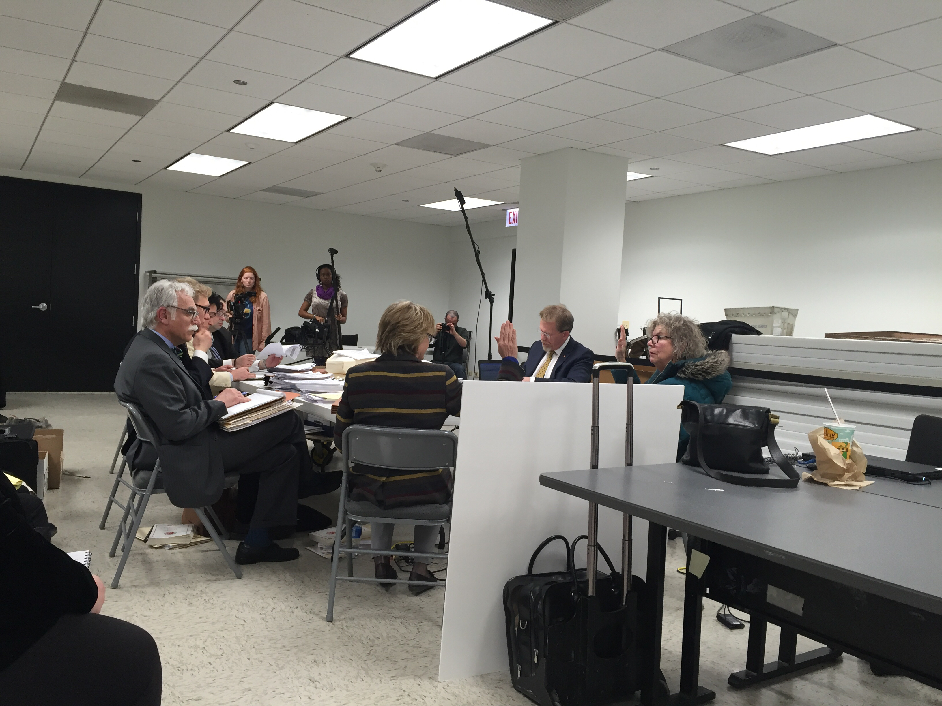Andrea Raila sits for questioning during a hearing to challenge her petitions for Assessor from Frederick 